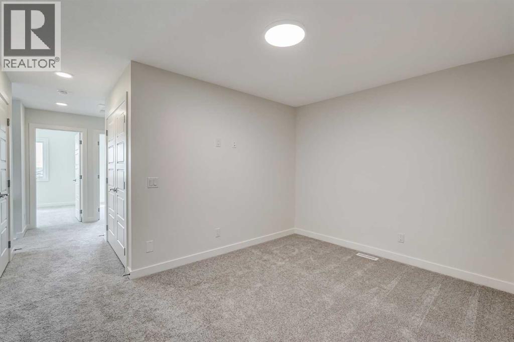 225 Bridgeport Gate, Chestermere, Alberta  T1X 3E2 - Photo 21 - A2342931
