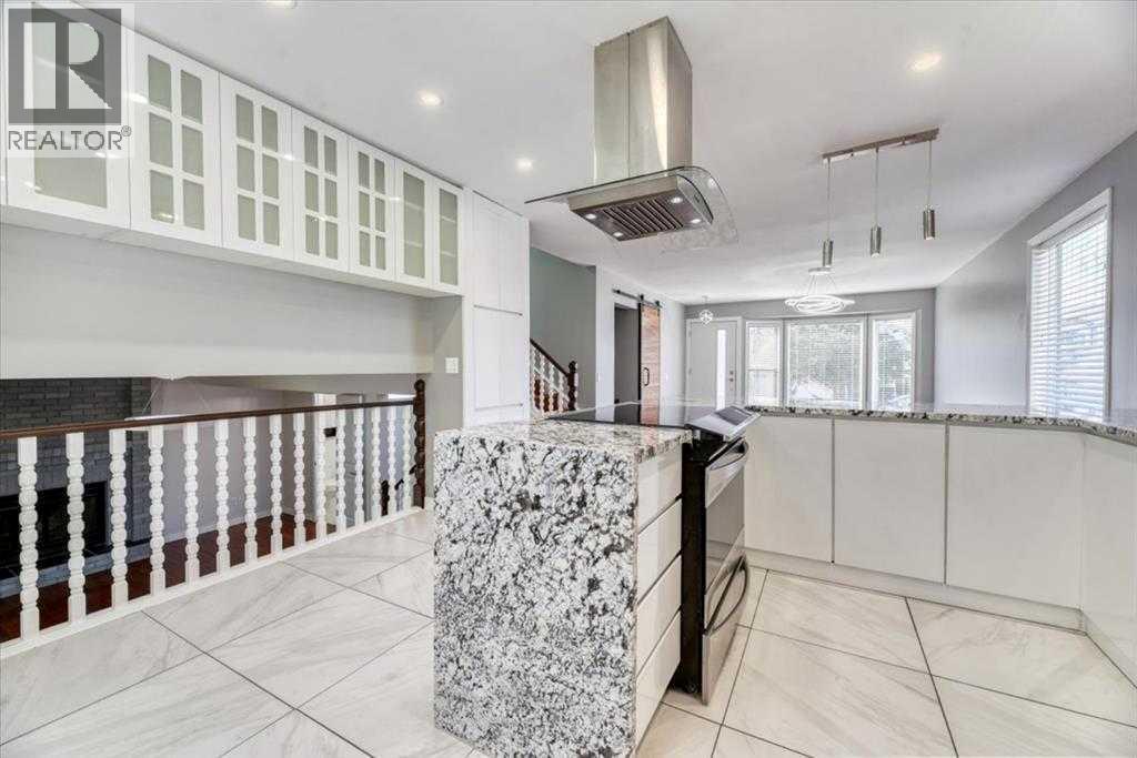 127 Woodstock Road Sw, Calgary, Alberta  T2W 5W3 - Photo 9 - A2339707