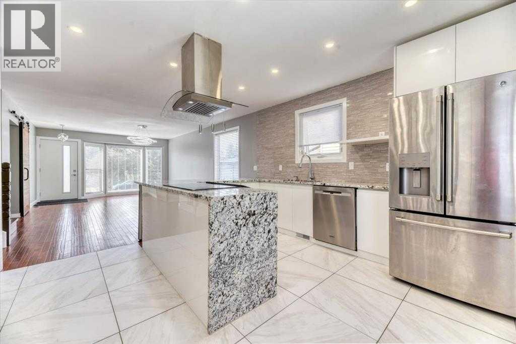 127 Woodstock Road Sw, Calgary, Alberta  T2W 5W3 - Photo 4 - A2339707