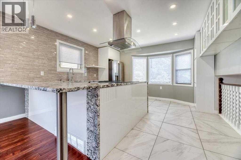127 Woodstock Road Sw, Calgary, Alberta  T2W 5W3 - Photo 7 - A2339707