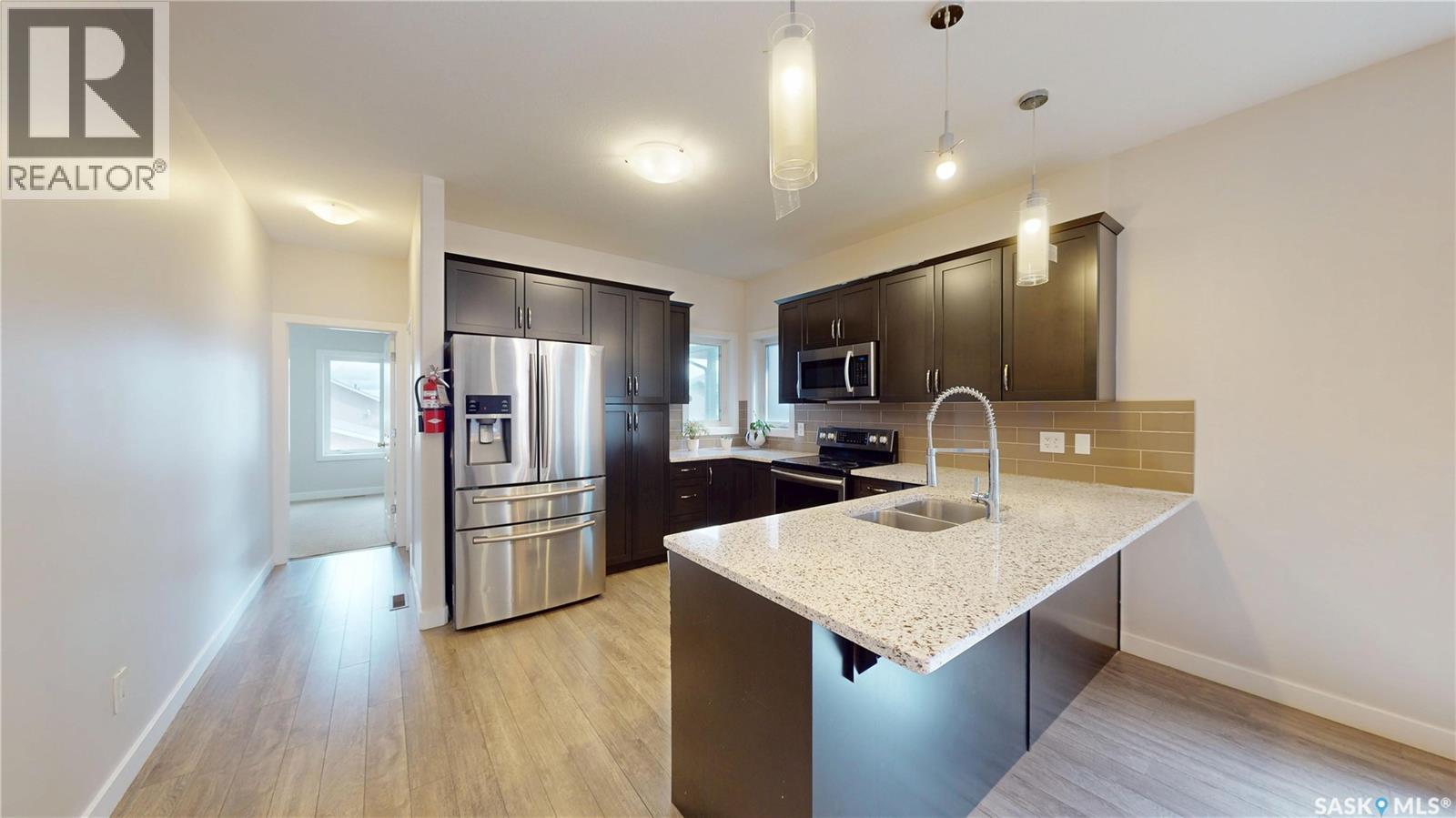 239 Bentley Court, Saskatoon, Saskatchewan  S7L 6L4 - Photo 3 - SK048023