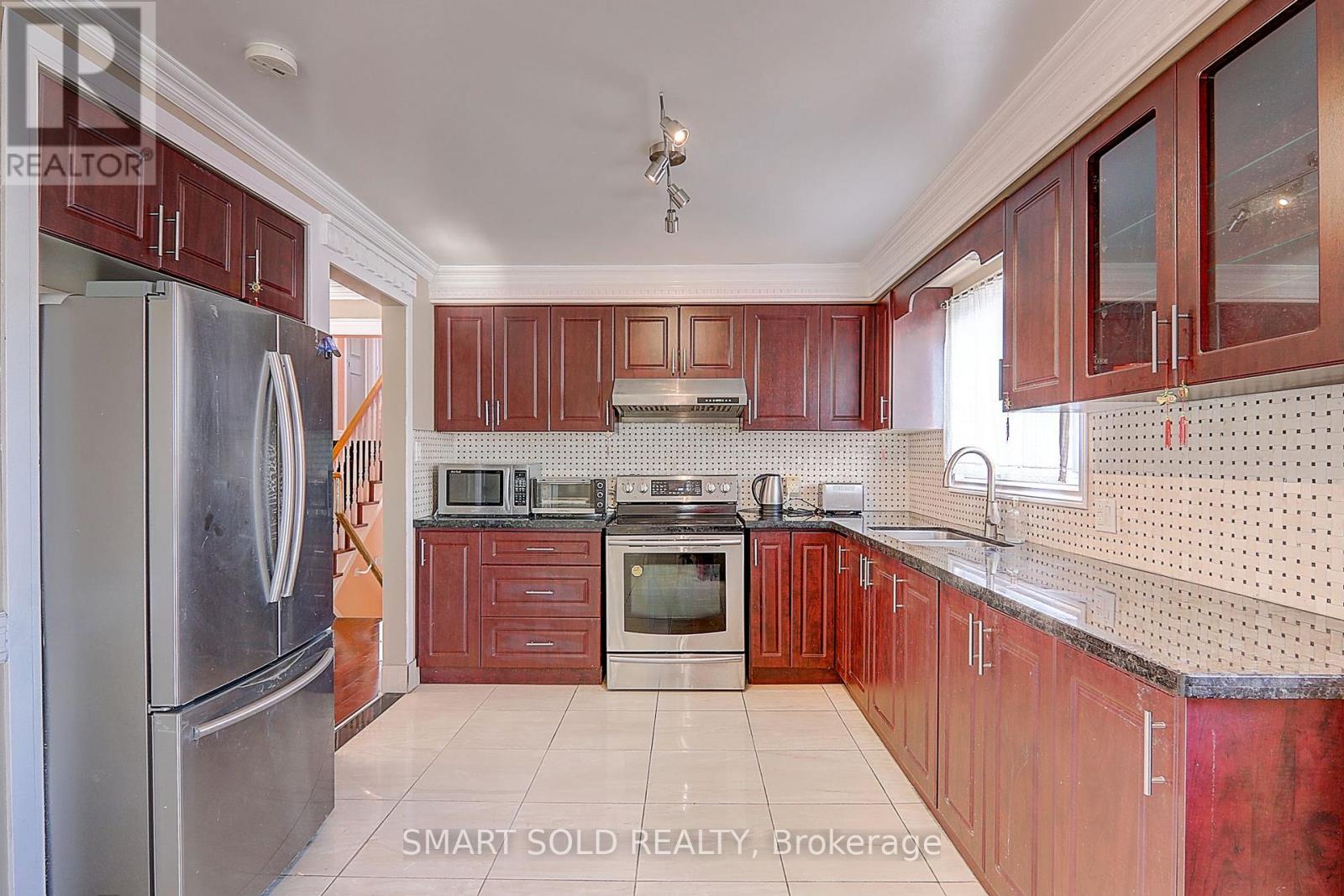 12 Glendinning Avenue, Toronto, Ontario  M1W 3G2 - Photo 11 - E13765512