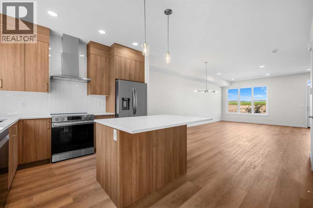 2057 Vantage Way Sw, Airdrie, Alberta  T4B 5Y5 - Photo 10 - A2338438