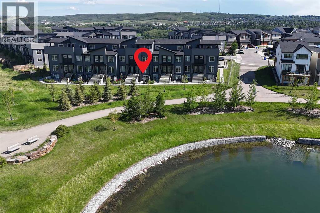 412, 260 Rowley Way NW, Calgary, Alberta  T3L 0H5 - Photo 1 - A2323969