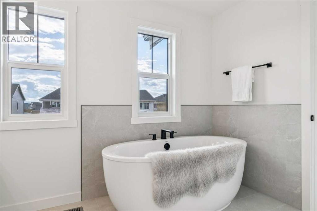 202 Harmony Circle, Rural Rocky View County, Alberta  T3Z 0K9 - Photo 32 - A2325436