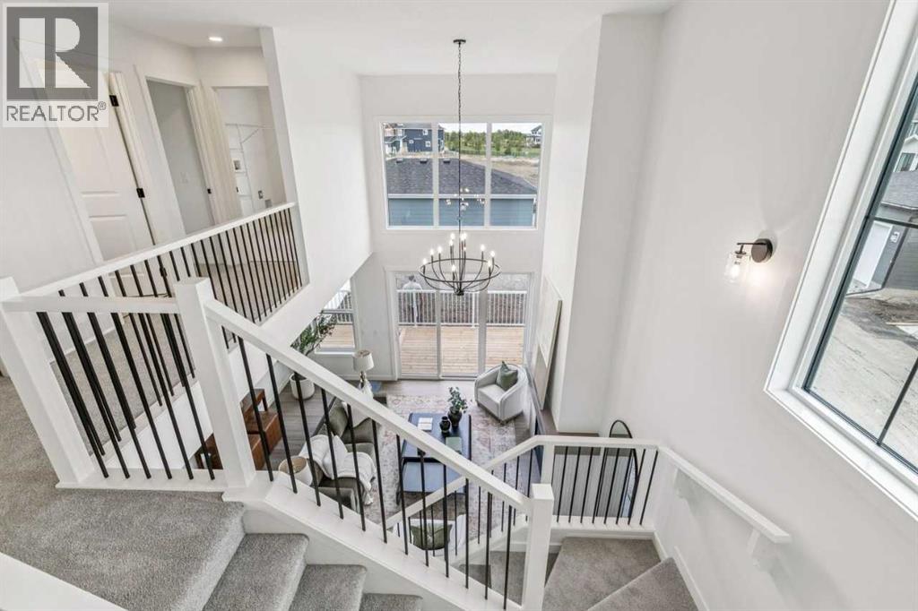 202 Harmony Circle, Rural Rocky View County, Alberta  T3Z 0K9 - Photo 19 - A2325436