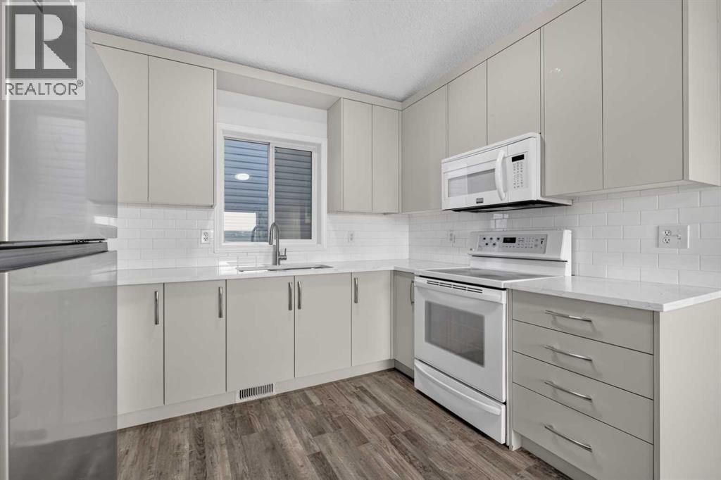 44 Harvest Gold Circle NE, Calgary, Alberta  T3K 4H3 - Photo 9 - A2344076