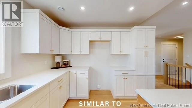 17 Wetmore Boulevard Unit# 24, Quispamsis, New Brunswick  E2E 0Y9 - Photo 9 - NB140554