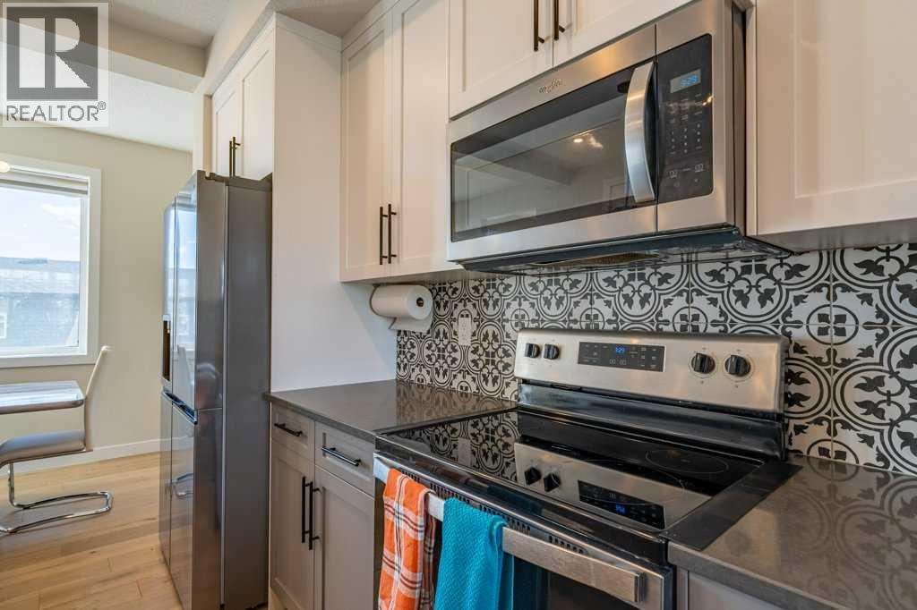 153 Waterford Boulevard, Chestermere, Alberta  T1X 2M9 - Photo 8 - A2329836