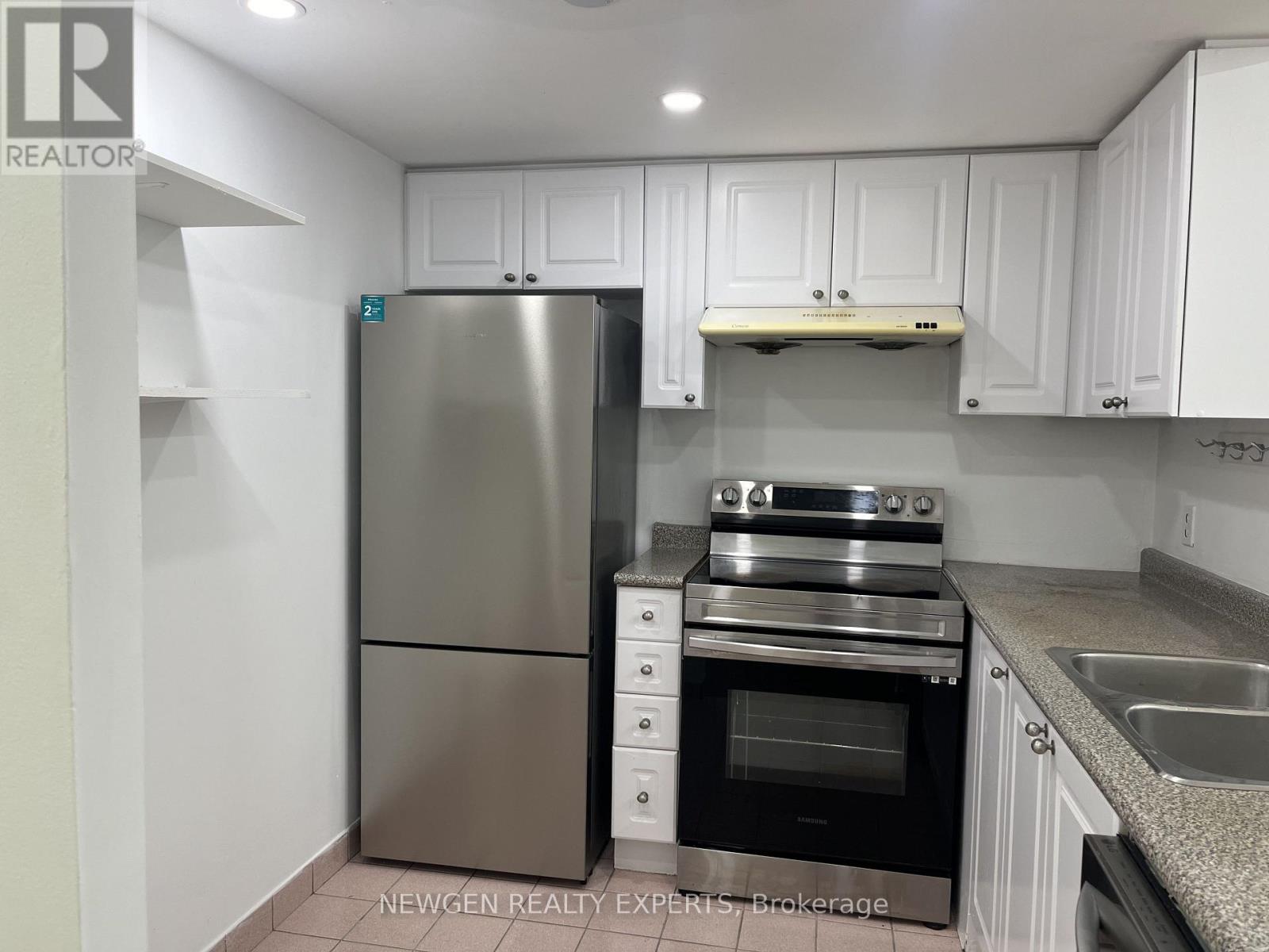 303 - 8 Lee Centre Drive, Toronto, Ontario  M1H 3H8 - Photo 4 - E13769290