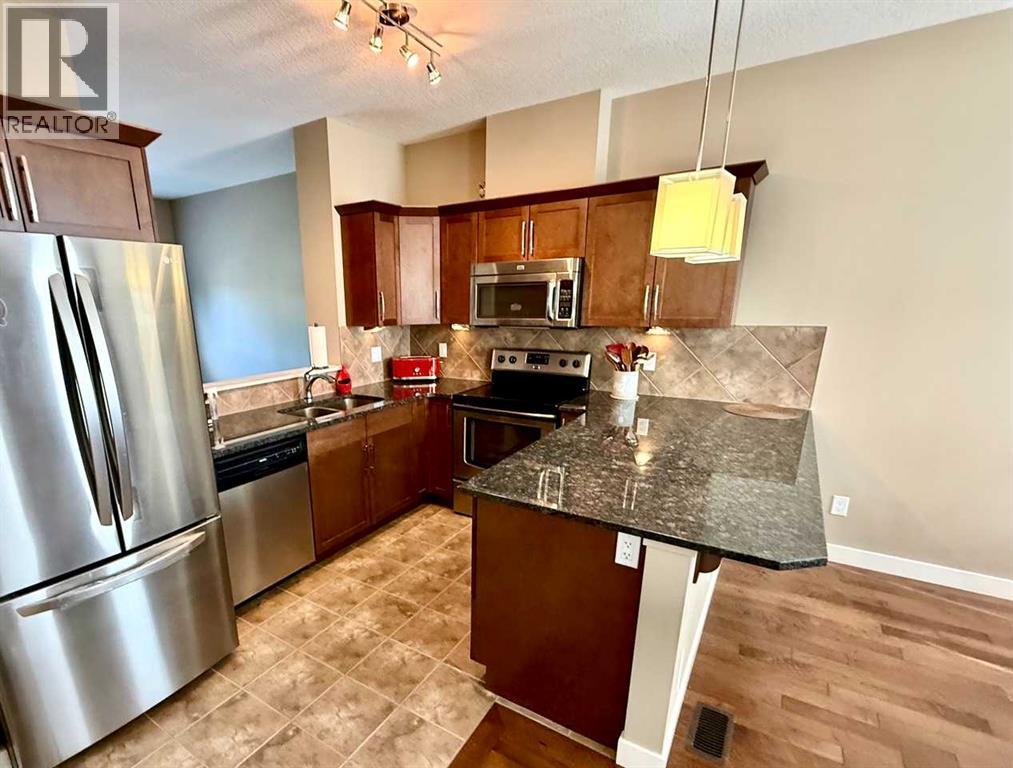 913 Evanston Square NW, Calgary, Alberta  T3P 0G9 - Photo 11 - A2322872
