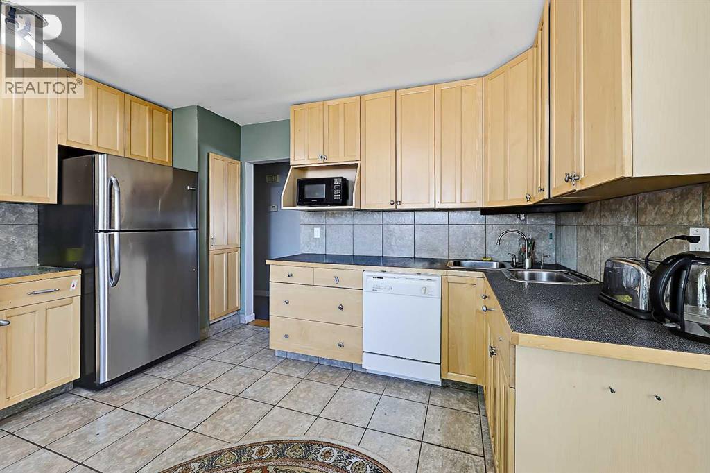 3 Creston Crescent Nw, Calgary, Alberta  T2M 4J9 - Photo 12 - A2342846