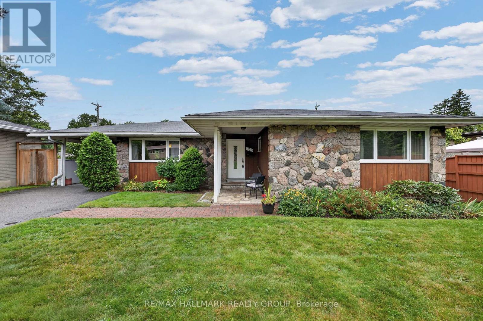 Welcome to this spacious  (Approx. 1,600 sq.ft.) and well-located 4-bedroom, 3-bathroom bungalow in sought-after Glabar Park, offering a comfortable layout, generous living spaces, and excellent potential for a new family to make this home.  A covered front entry welcomes you before entering the home, providing a charming and practical outdoor spot to enjoy in warm weather. The main level features a bright living room with large windows and a wood-burning fireplace, creating a warm and inviting space for relaxing or entertaining. The dining room includes a patio door providing convenient access to the side of the property. The kitchen offers plenty of workspace and storage, complemented by a large eat-in area ideal for casual family meals. The primary bedroom is a good size and features double closets, while three additional bedrooms provide flexibility for children, guests, or a home office. There are two four-piece bathrooms on the main level. Hardwood flooring is found in two of the bedrooms, hardwood is underneath the carpeting in the living room & dining room. Most windows have been updated. The lower level (another 1,600 sq.ft ) adds valuable living space ready for your personal touches. This level offers 2 large recreation rooms, one that could serve as a TV/family room, office, gym, or hobby space, a two-piece bathroom, laundry area, and abundant storage. Located in an established, family-friendly neighbourhood, 936 Parkhurst is close to schools, parks (Kingsmere Park is at the bottom of the street), shopping, restaurants, and the everyday conveniences of being a five minute walk to Carlingwood Mall & Fairlawn Plaza. 48 hr irrevocable on all offers please. (id:48254)