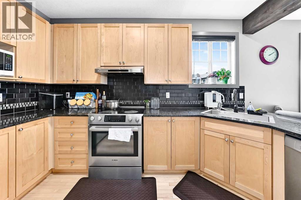 1200 Ravenswood Drive SE, Airdrie, Alberta  T4A 0G7 - Photo 12 - A2343153