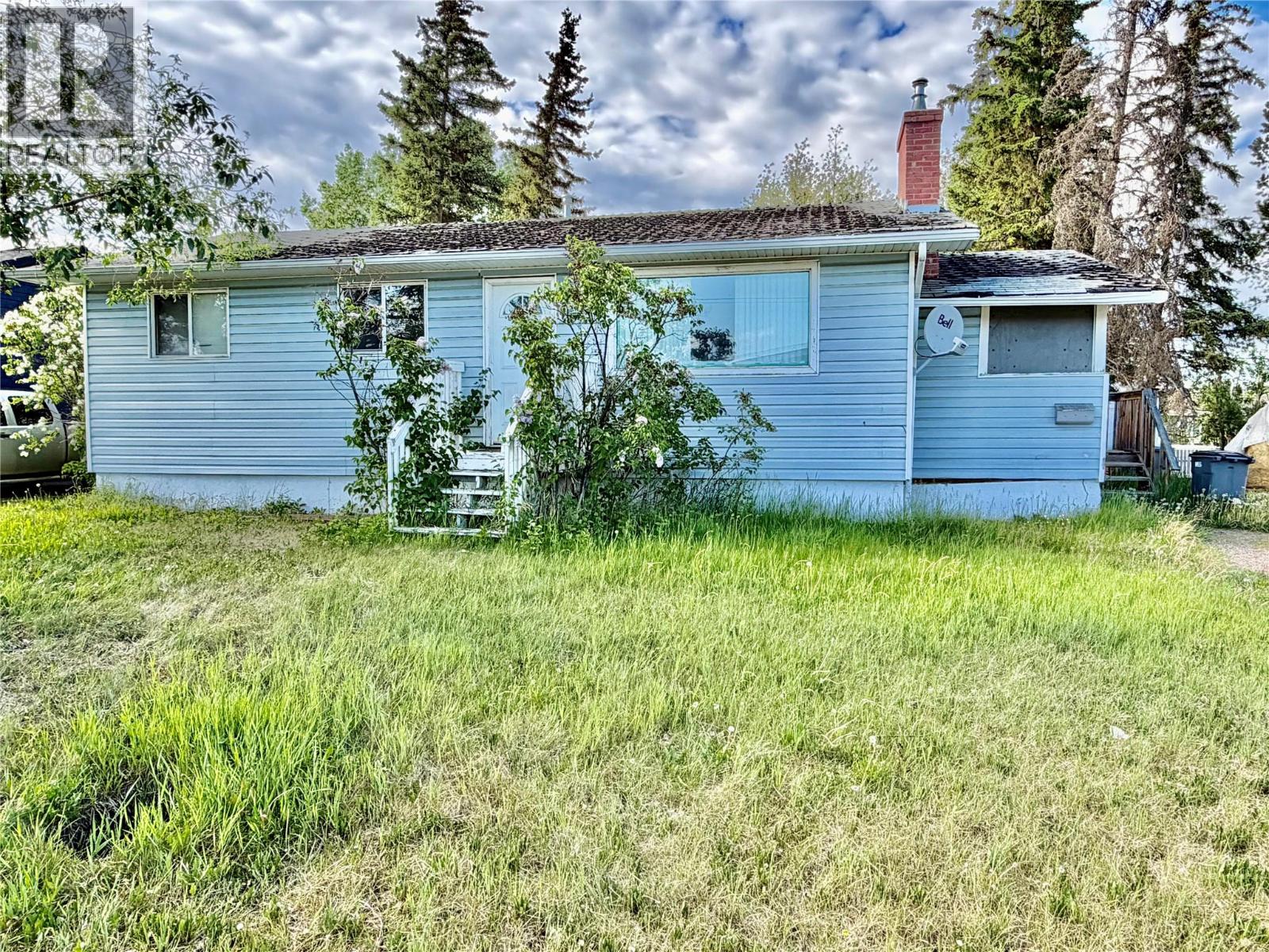 1520 111 Avenue, Dawson Creek, British Columbia  V1G 2X7 - Photo 1 - 10390825