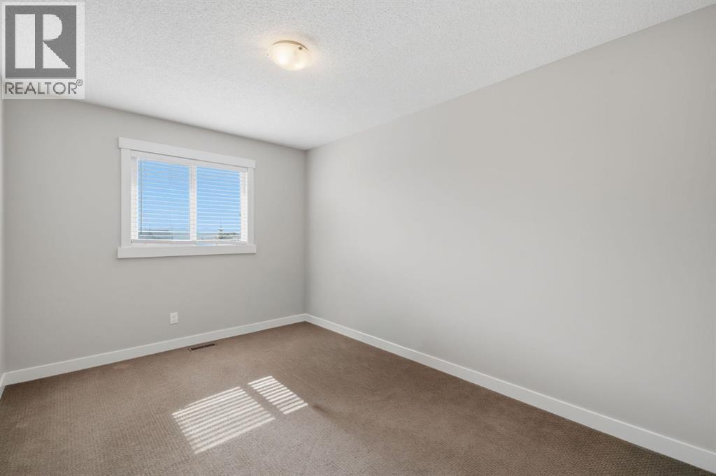 79 Sunrise View, Cochrane, Alberta  T4C 0M8 - Photo 24 - A2342497