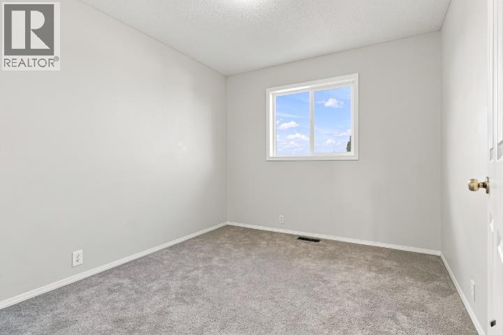 1095 Bridlemeadows Manor Sw, Calgary, Alberta  T2Y 4L1 - Photo 32 - A2342873