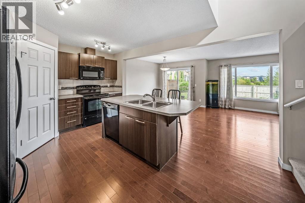 57 Sunset Common, Cochrane, Alberta  T4C 0M1 - Photo 7 - A2341332
