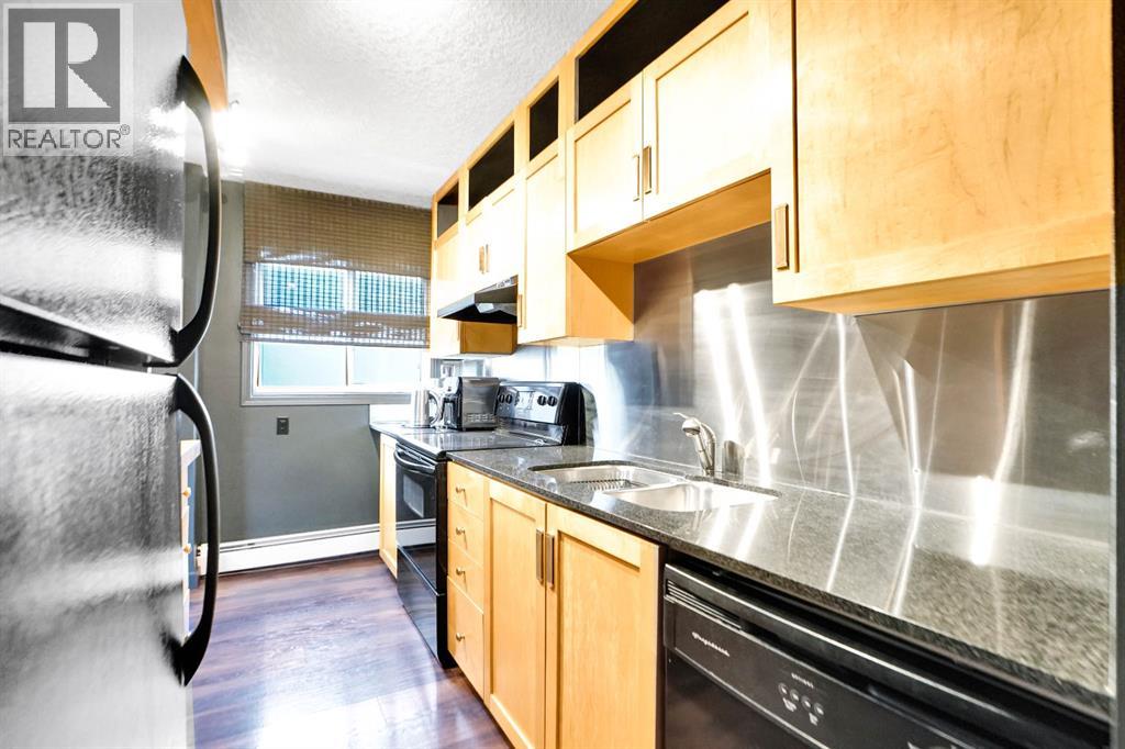 405, 823 19 Avenue SW, Calgary, Alberta  T2T 0H6 - Photo 3 - A2311506