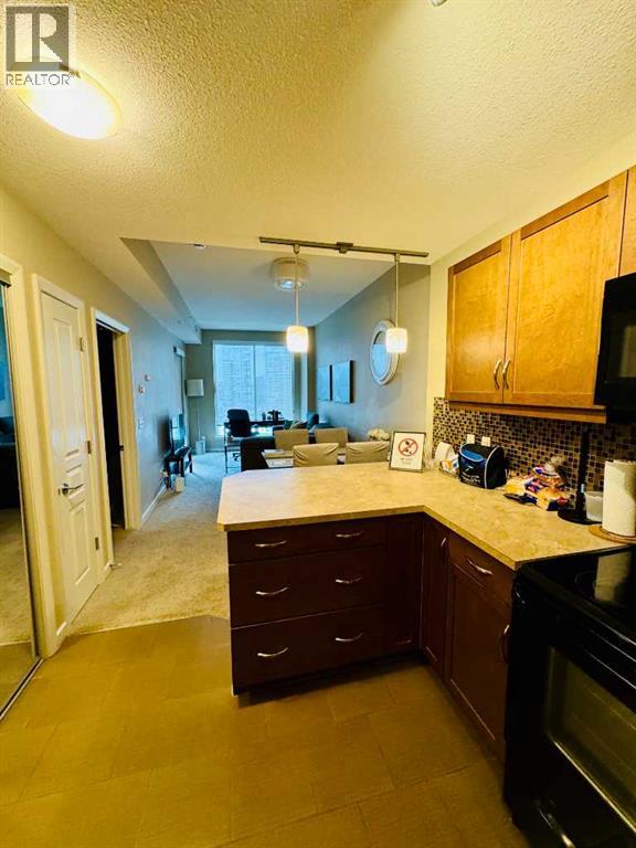1205, 1320 1 Street SE, Calgary, Alberta  T2G 0G8 - Photo 4 - A2343039