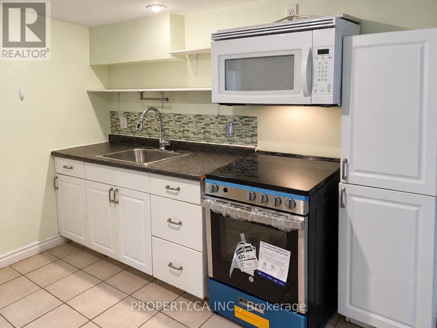 Lower Level - 83 St John Road, Toronto, Ontario  M6P 1T8 - Photo 4 - W13775856