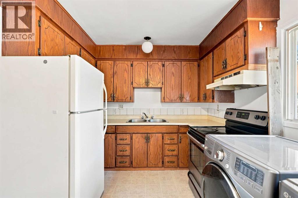 529 28 Avenue NW, Calgary, Alberta  T2M 2K9 - Photo 13 - A2344849