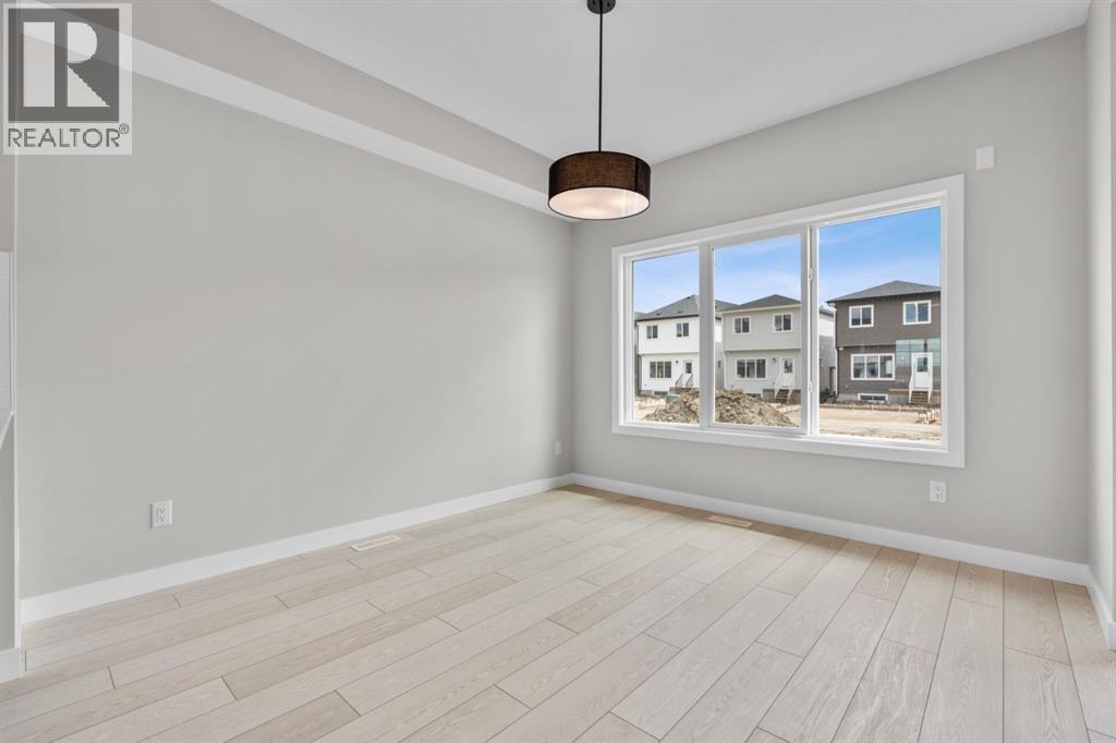 9989 Huxbury Drive NE, Calgary, Alberta  T2A 8C3 - Photo 11 - A2317243