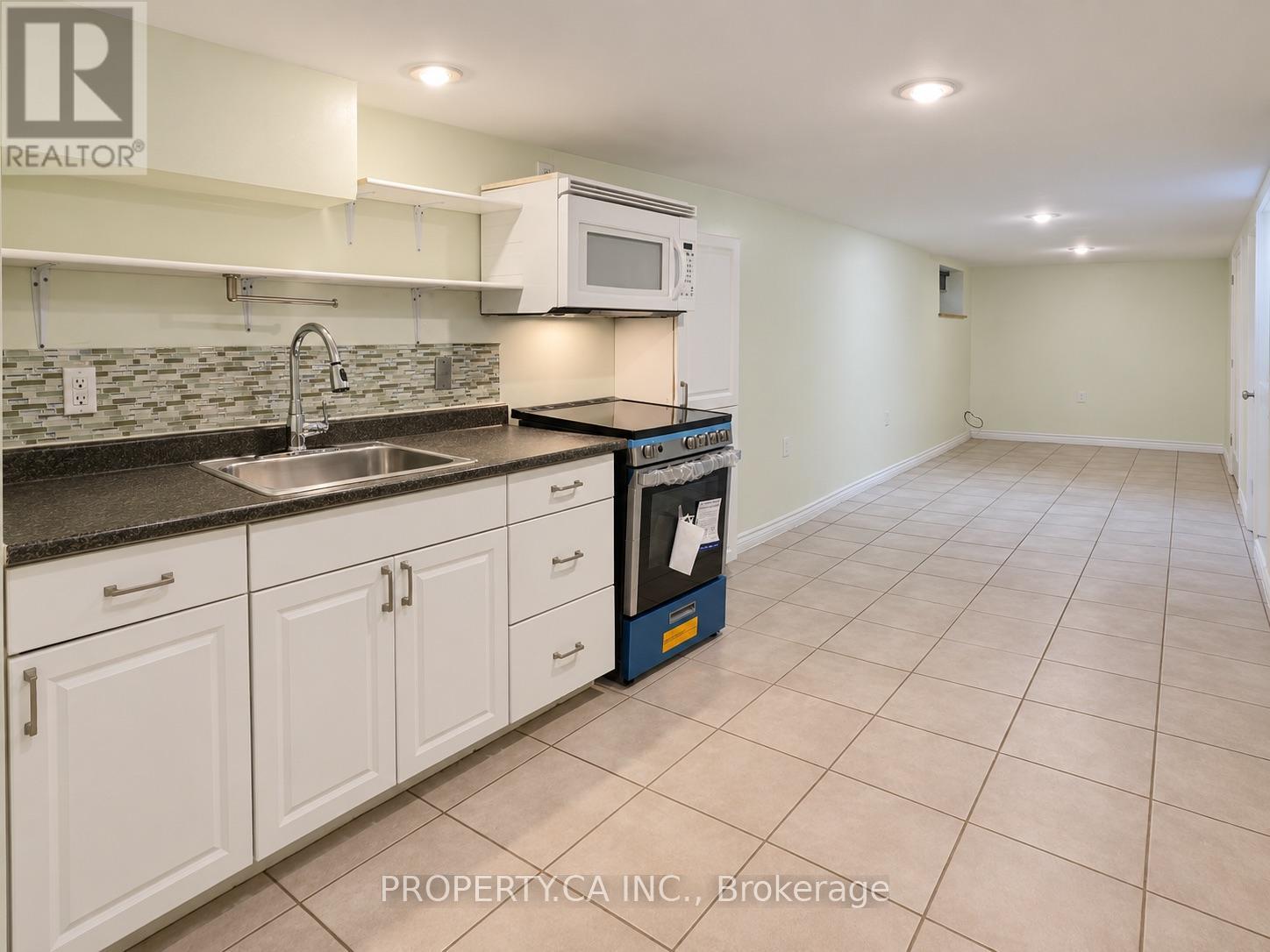 Lower Level - 83 St John Road, Toronto, Ontario  M6P 1T8 - Photo 3 - W13775856