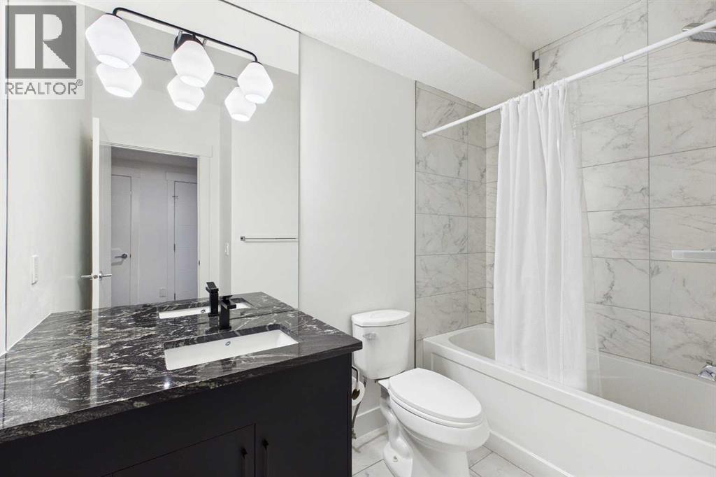 406 33 Avenue NW, Calgary, Alberta  T2K 0B4 - Photo 37 - A2344621