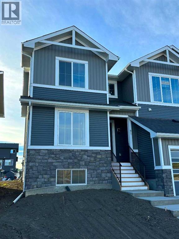 91 Agate Road, Cochrane, Alberta  T4C 3B9 - Photo 1 - A2344149