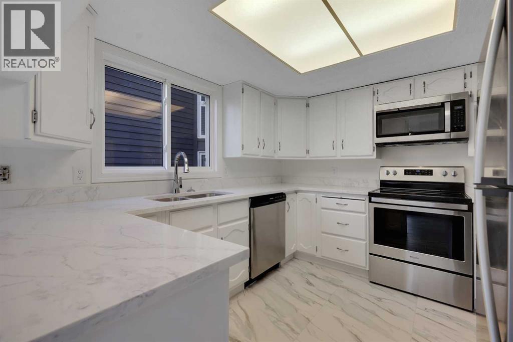 13632 Deer Run Boulevard SE, Calgary, Alberta  T2J 6P1 - Photo 7 - A2344131