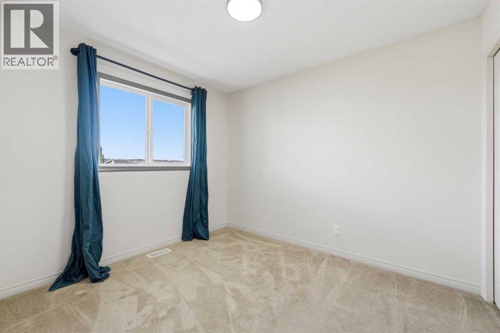 161 Sunset Common, Cochrane, Alberta  T4C 0L9 - Photo 37 - A2343544