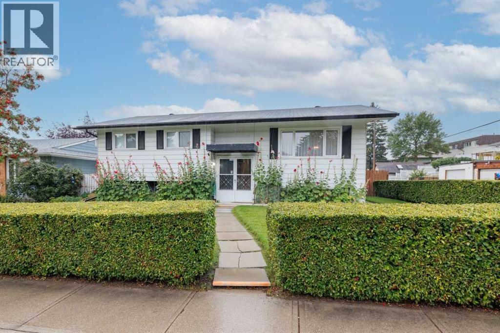 67 Huntham Road Ne, Calgary, Alberta  T2K 4G2 - Photo 2 - A2344774