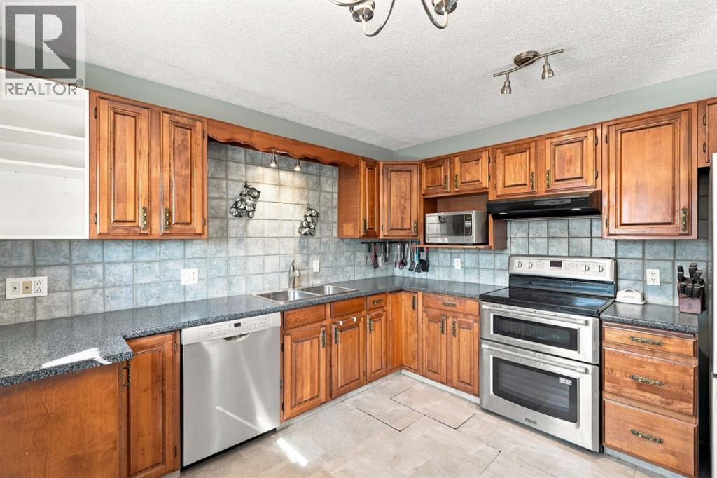 619 101 Avenue Sw, Calgary, Alberta  T2W 0A2 - Photo 9 - A2341191