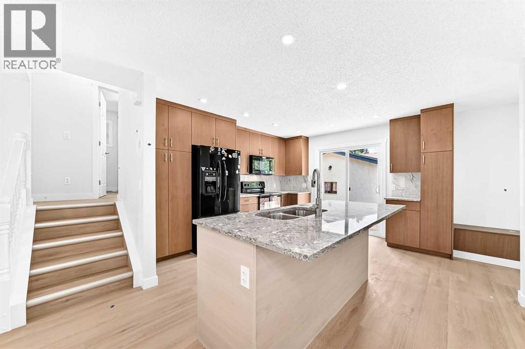 55 Mckinley Way Se, Calgary, Alberta  T2Z 1V1 - Photo 3 - A2344857