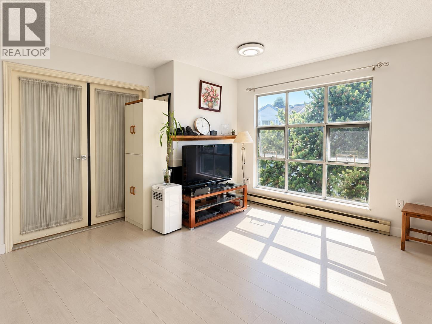 305 7580 Minoru Boulevard, Richmond, British Columbia  V6Y 1Z5 - Photo 2 - R3164348
