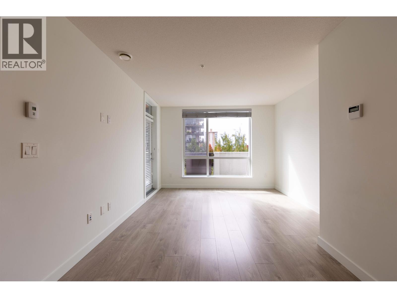 203 108 E 8th Street, North Vancouver, British Columbia  V7L 0H1 - Photo 2 - R3164411