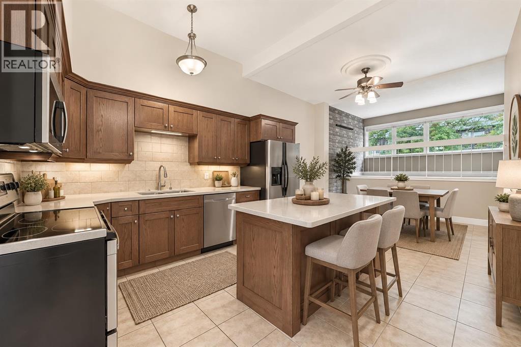 84 Brae Glen Lane SW, Calgary, Alberta  T2W 1B6 - Photo 11 - A2339552