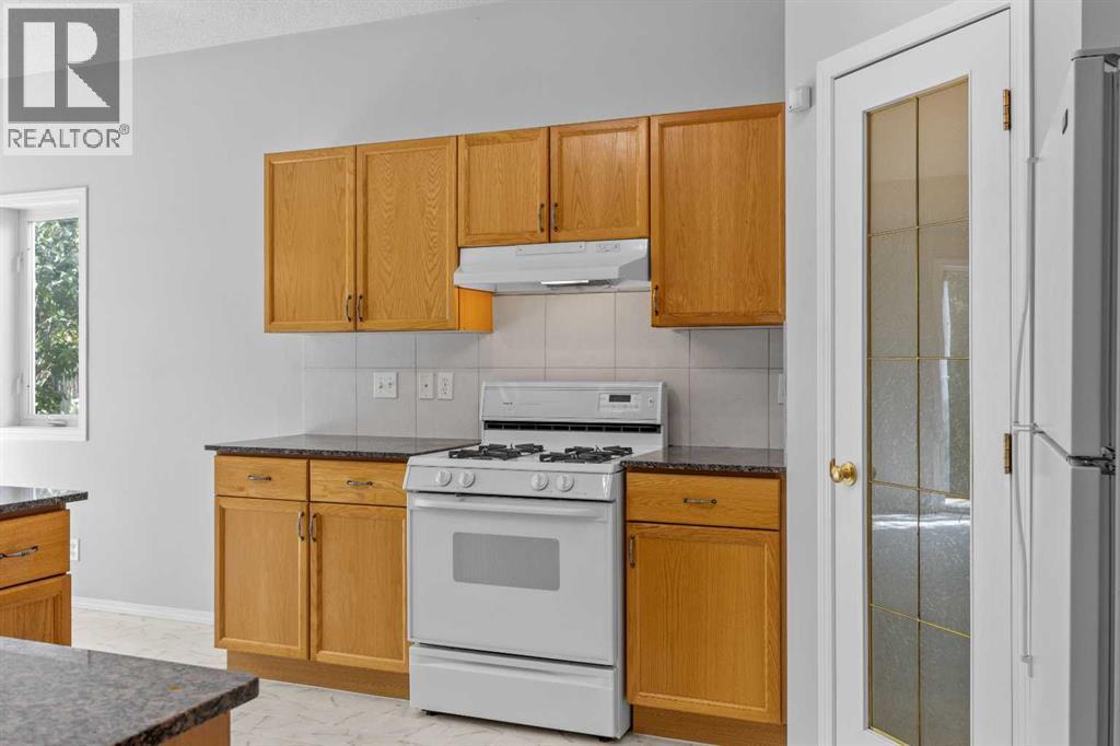 15 Hidden Ranch Crescent Nw, Calgary, Alberta  T3A 5W5 - Photo 10 - A2343793