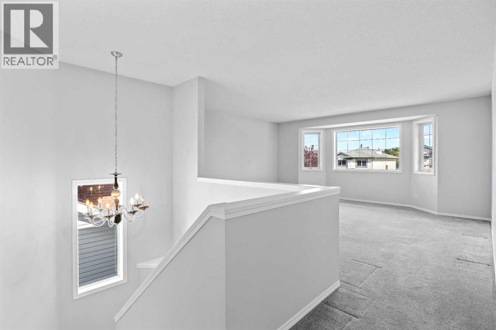 15 Hidden Ranch Crescent Nw, Calgary, Alberta  T3A 5W5 - Photo 18 - A2343793