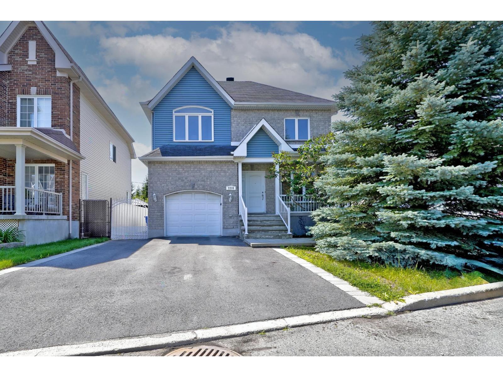 2235 Rue des Cigognes Laval (Sainte-Rose) Quebec Canada H7L0A9 3