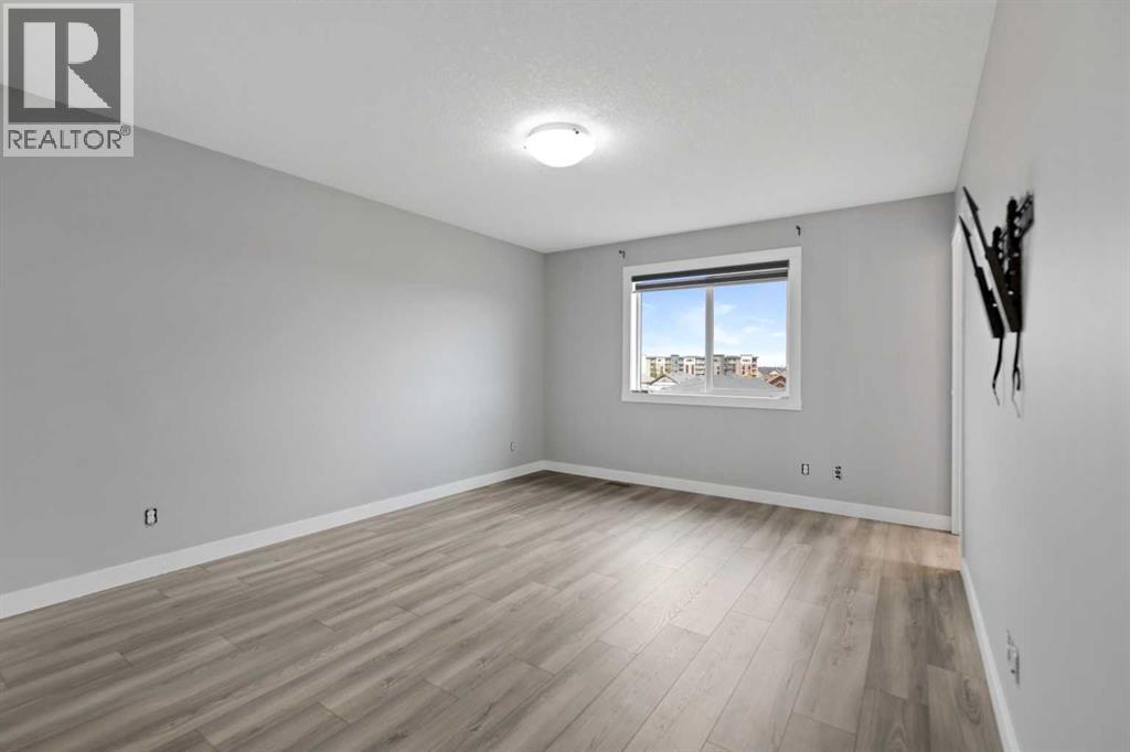 205 Hillcrest Drive SW, Airdrie, Alberta  T4B 0Y8 - Photo 19 - A2345032