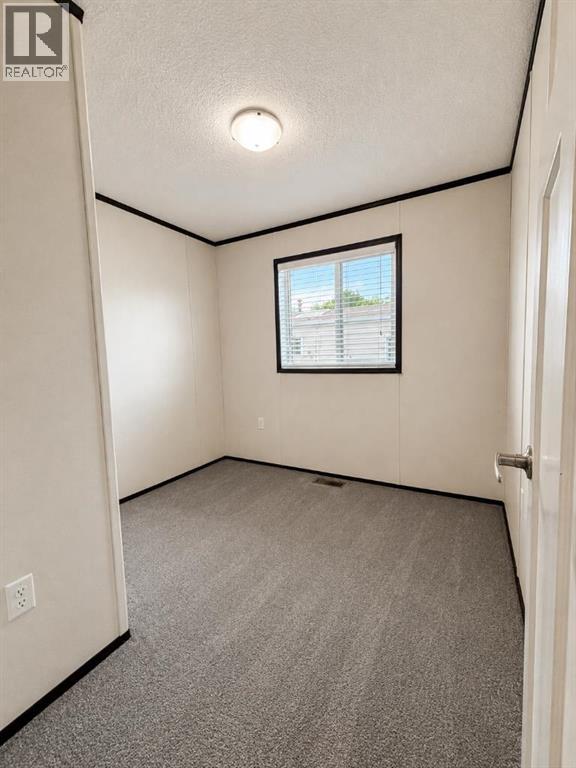 113 Heritage Drive, Okotoks, Alberta  T1S 1M4 - Photo 12 - A2338177