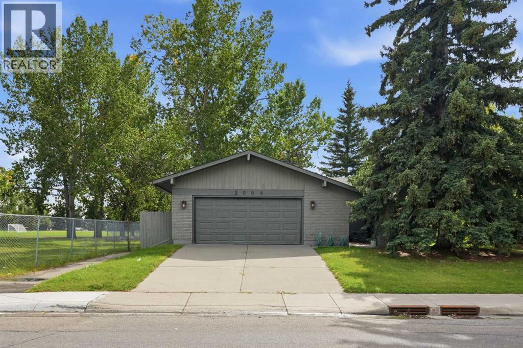 2004 Lake Bonavista Drive Se, Calgary, Alberta  T2J 4B5 - Photo 1 - A2342825
