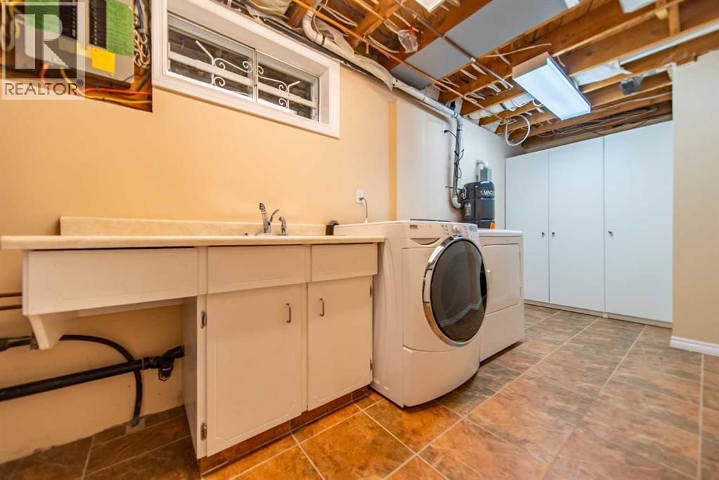 116 Queensland Place Se, Calgary, Alberta  T2J 4G8 - Photo 28 - A2343171