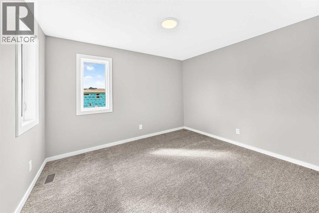 2084 Lancaster Heights SE, Airdrie, Alberta  T4A 3P7 - Photo 22 - A2334946