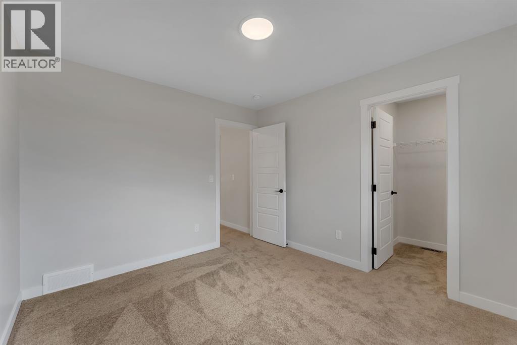 821 Baywater Place Sw, Airdrie, Alberta  T4B 3V3 - Photo 36 - A2299587