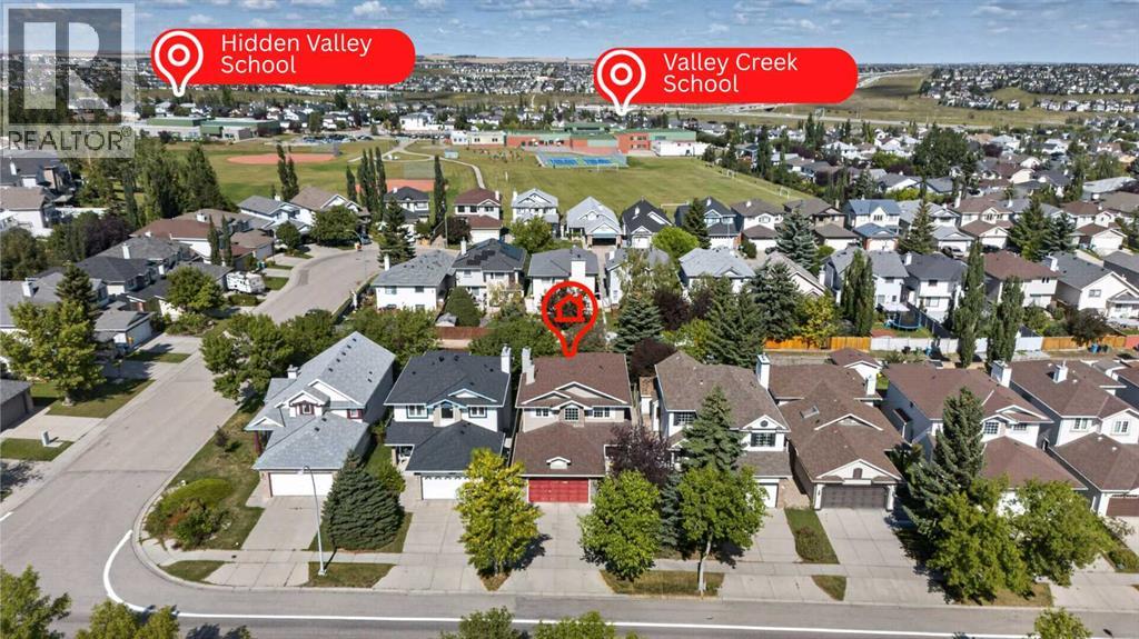 9867 Hidden Valley Drive Nw, Calgary, Alberta  T3A 5K5 - Photo 4 - A2342671