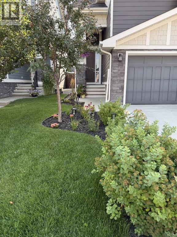 68 Sunrise Way, Cochrane, Alberta  T4C 2S3 - Photo 2 - A2340584