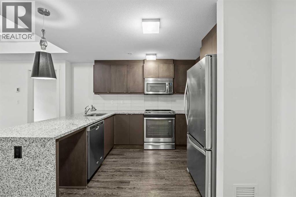 107, 45 Aspenmont Heights Sw, Calgary, Alberta T3H 0E6 - Photo 5 - A2345097